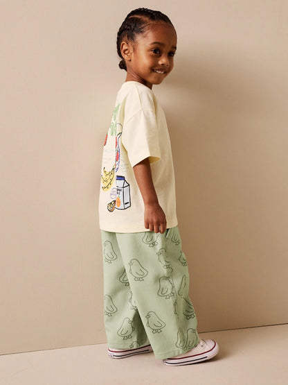 |Girl| Calças Largas Com Estampa De Patinhos Verdes (3 meses a 7 anos)