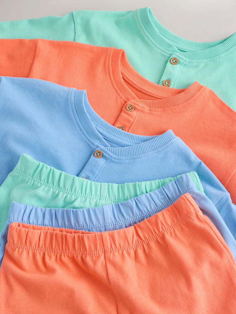 |Boy| Conjunto Com 3 Pijamas Curtos Lisos Em Tons Pastel Azul/Verde/Laranja (9 meses a 10 anos)