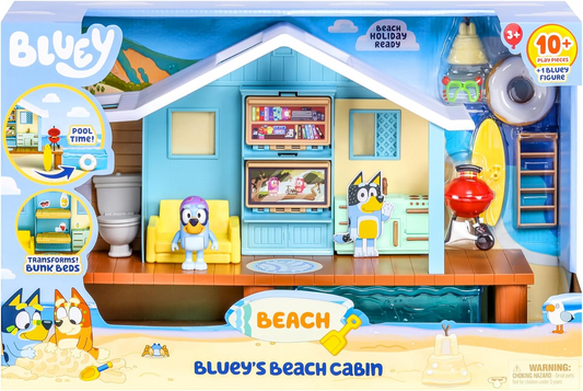 Set de juego Bluey Beach Hut, que incluye la figura exclusiva de Bluey con gafas. Incluye 10 piezas de juego y hoja de pegatinas.