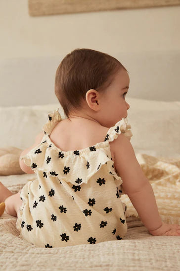 |BabyGirl| Macaquinho De Bebê Com Tiras Texturizadas - Creme/Preto Floral