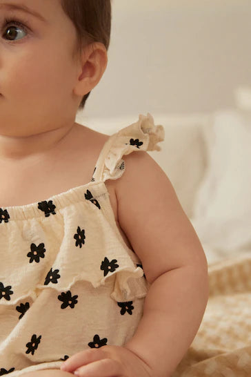 |BabyGirl| Macaquinho De Bebê Com Tiras Texturizadas - Creme/Preto Floral