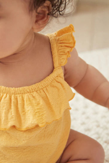 |BabyGirl| Macacão De Bebê Com Tiras Texturizado - Amarelo