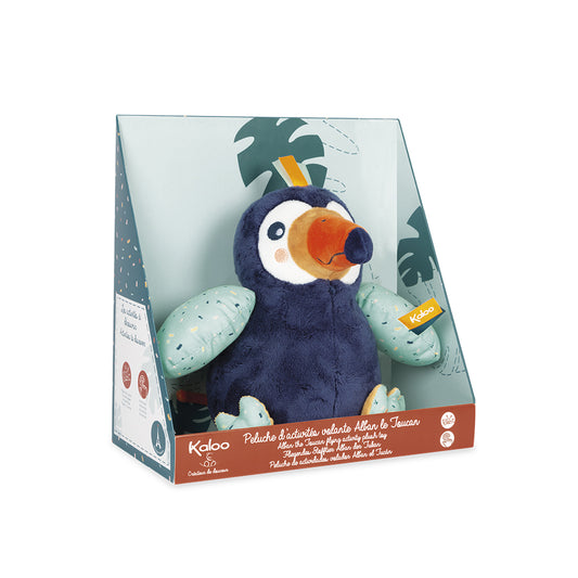 Tucán de peluche Kaloo que bate sus alas
